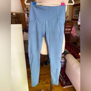Victoria’s Secret Sport light blue leggings with pockets and sheer designs